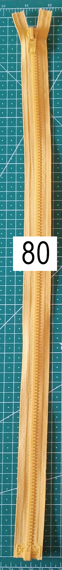 Dragkedja artikel 80, gul